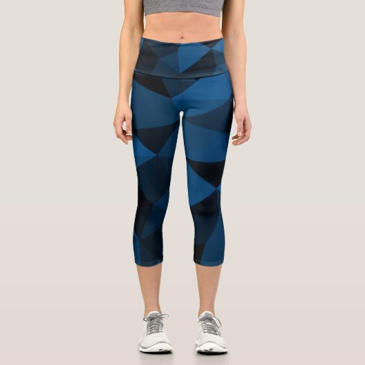 Dunkelblaues und schwarzes geometrisches Maschenmu Capri Leggings (Vorderseite)
