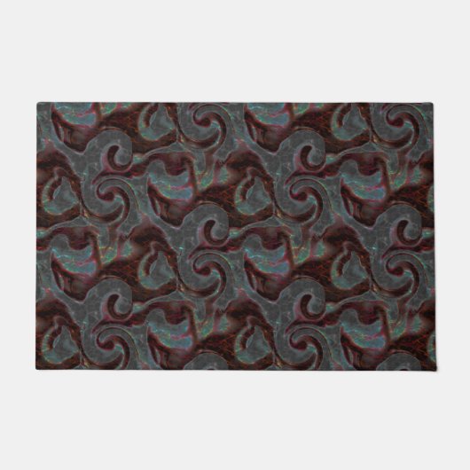 Dunkelfarbene, geschnitzte Spiralteile und glühend Fußmatte (Vorderseite)