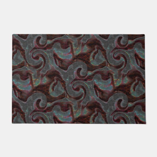 Dunkelfarbene, geschnitzte Spiralteile und glühend Fußmatte (Vorderseite)