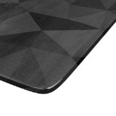Dunkelgraues und schwarzes geometrisches Maschenmu Schneidebrett (Ecke)