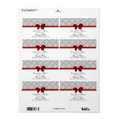 Dunkelgraues weißes Damaskochetikett mit rotem Bow (Vorne)