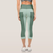 Dunkelgrün und Pastellgrün Capri Leggings (Rückseite)