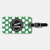 Dunkelgrüne u. schwarze große Polka-Punkte mit Gepäckanhänger (Vorderseite horizontal)