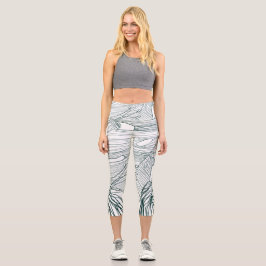 dunkelgrüne und aquamarine Monstera-Blätter & Lili Capri Leggings