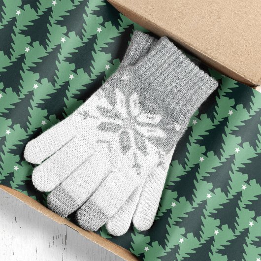 Dunkelgrüne Weihnachtsbaumen auf Grün Seidenpapier