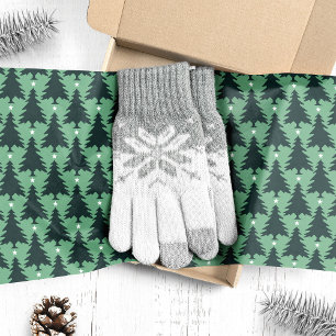 Dunkelgrüne Weihnachtsbaumen auf Grün Seidenpapier