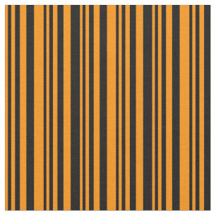 Dunkelorange- und schwarz-farbenes Muster Stoff