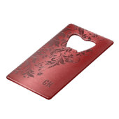 Dunkelroter Hintergrund und floraler Schnappschuss Geldbeutel Flaschenöffner (Vorderseite Schrägansicht)