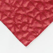 Dunkelrotes Kunstleder in der Nähe. Fleecedecke (Ecke)