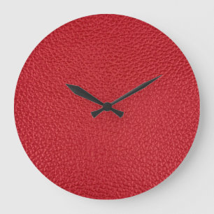 Dunkelrotes Kunstleder in der Nähe. Große Wanduhr