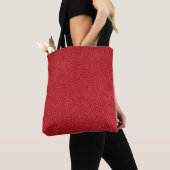 Dunkelrotes Kunstleder in der Nähe. Tasche (Von Nahem)