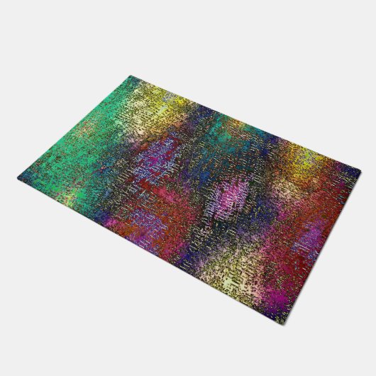 Dunkle, farbige grinöse Textur in kratzfarbiger Ti Fußmatte (Schrägansicht)