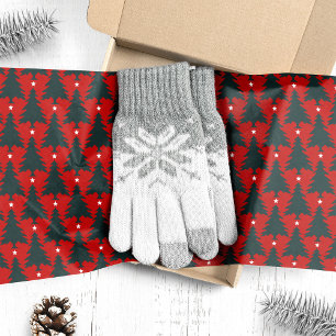 Dunkle grüne Weihnachtsbäume auf Rot Seidenpapier
