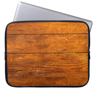 Dunkle Holzstruktur. Holzbraun. Hintergrund Laptopschutzhülle