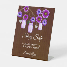 Dunkle rustikale Lila Blumenmason Jar Hochzeitsich Sockelschild