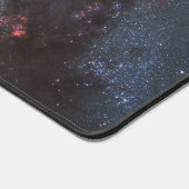 Dunkle Streifen von Staubkreuzen überqueren Centau Schreibtischunterlage (Ecke)