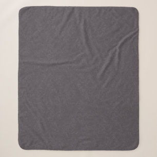 Dunkle violette texturierte Oberfläche mit wirbeln Sherpadecke