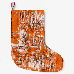 Dunkler brauner Grunge-Hintergrund. Schwarz weiß o Kleiner Weihnachtsstrumpf