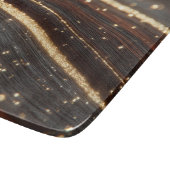 Dunkler Walnussbaum mit glänzenden Goldflüssen Schneidebrett (Ecke)