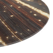 Dunkler Walnussbaum mit glänzenden Goldflüssen Schneidebrett (Ecke)