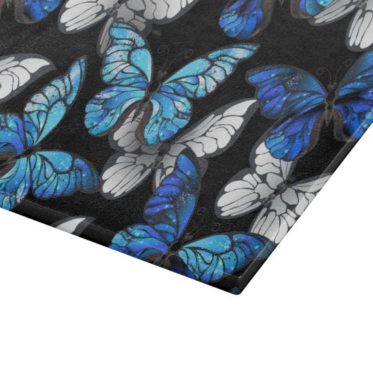 Dunkles Nahtloses Muster mit blauen Schmetterlinge Schneidebrett (Ecke)