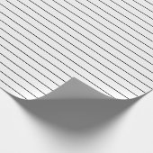 Dünne schwarze Streifen auf weißem Party oder Weih Geschenkpapier (Ecke)