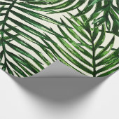 Dünnes grünes tropisches Blätter auf Weiß Geschenkpapier (Ecke)