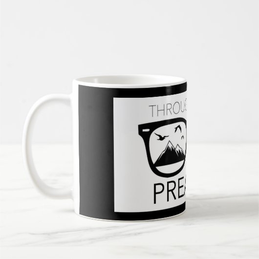 Durch das Auge einer Prediger-Kaffee-Tasse Kaffeetasse (Links)