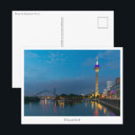 Düsseldorf Deutschland Postkarte<br><div class="desc">Nachtaufnahme von Düsseldorf,  einer der größten deutschen Städte,  am Rheinufer gelegen.</div>