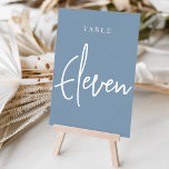 Dusty Blue Hand Scripted Table ELEVEN Tischnummer<br><div class="desc">Einfache und schicke Tischnummer-Karten in Dusty Blue und Weiß machen eine elegante Aussage bei Ihrer Hochzeit oder Veranstaltung. Das Design bietet "table [number]" in einem spannenden Mix aus klassischen Serifen und handgeschriebenen Skripten. Design wiederholt sich auf beiden Seiten. Einzelne nummerierte Karten werden separat verkauft; bestellen Sie jede Tischnummer einzeln aus...</div>