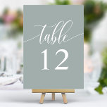 Dusty Sage Minimalistisch Calligrafy Wedding Tischnummer<br><div class="desc">Freuen Sie sich auf die elegante Atmosphäre Ihres Hochzeitsempfängers. Diese minimalistischen Tischnummern enthalten ein Single,  "Table",  in einem zarten Kalligraphieskript auf einem beruhigenden,  staubigen Weisheitshintergrund. Das schlichte und dennoch raffinierte Design verleiht Ihrem Tisch eine Touch von Eleganz und verleiht Ihrem Ambiente ein angenehmes Ambiente.</div>