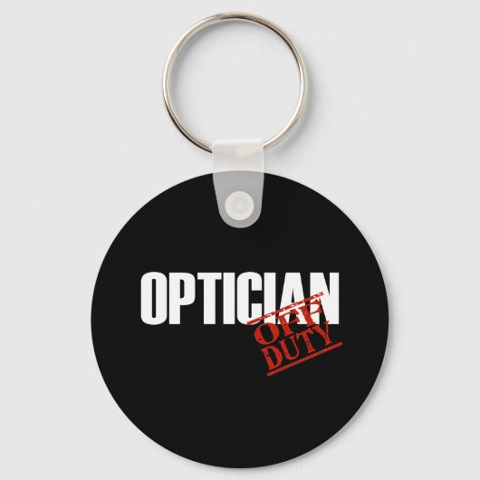 DUTZENOPTIKER DARK SCHLÜSSELANHÄNGER (Vorderseite)