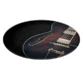 E-Gitarre auf Schwarz Schneidebrett (Ecke)