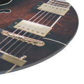 E-Gitarre auf Schwarz Schneidebrett (Ecke)