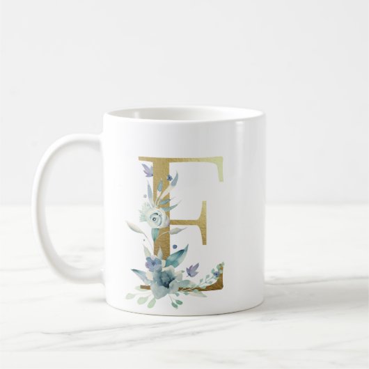 E Golden initial mit blauem Blumenblättern Kaffeetasse (Links)