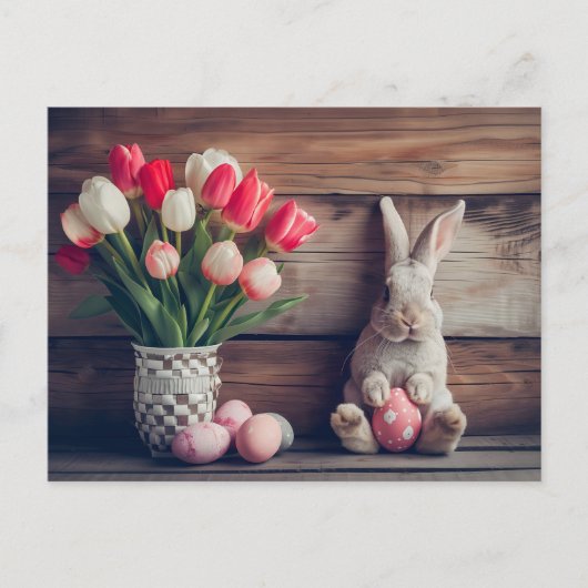 Easter bunny seated beside colorful eggs and tulip postkarte (Vorderseite)