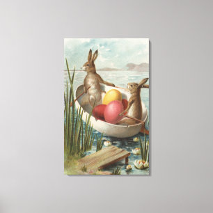 EasterBunnies in einem Boot mit farbigen Eiern Leinwanddruck
