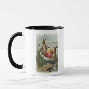 EasterBunnies in einem Boot mit farbigen Eiern Tasse