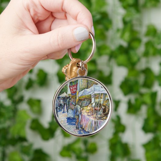 Ecke der Fliegenschweinfarm und Wein ein wenig. Schlüsselanhänger (Hand)