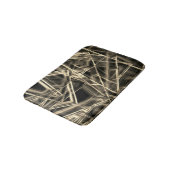 Ecken in dicken beigen Linien auf dunklen Badematte (Schrägansicht)