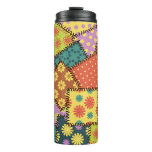 Eclectic Patchwork: Diverse Muster Mix Thermosbecher