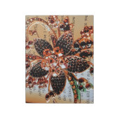 Edelsteine aus rotem Gold auf Kunsthandwerk Notizblock (Rotiert)