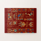 Egyptian hieroglyphs and deities on red puzzle (Horizontal)