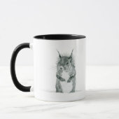Eichhörnchen, das Tasse zeichnet (Links)