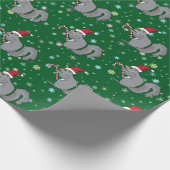 Eichhörnchen, das Zuckerstange hält und Geschenkpapier (Ecke)