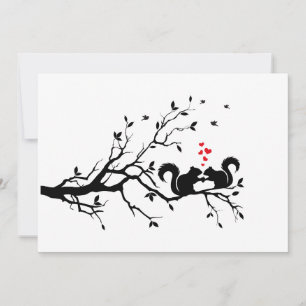 Eichhörnchen mit roten Herzen auf einem Baumzweig