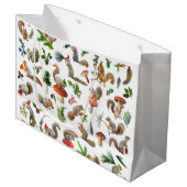 Eichhörnchen mit roter und grüner Geschenktasche Große Geschenktüte (Vorderseite Schrägansicht)