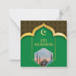 Eid Mubarak im grünen Hintergrund Mitteilungskarte