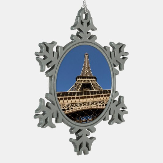 Eiffelturm von Paris in der französischen Tasse Schneeflocken Zinn-Ornament (Links)