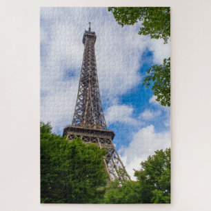 Eiffelturm zwischen blauem Himmel und Bäumen, Pari Puzzle